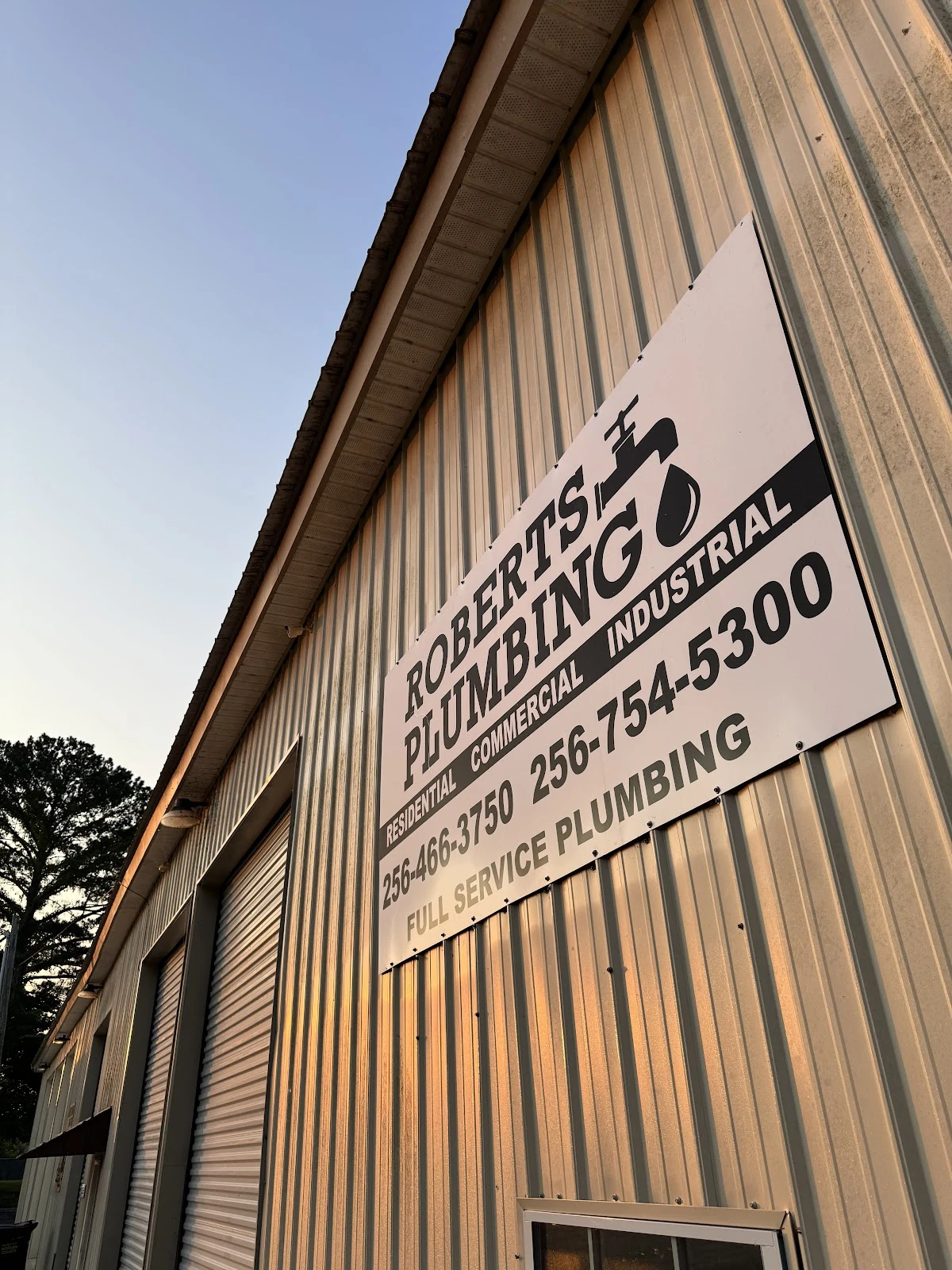 Inside Roberts Plumbing — shop interior and work bay